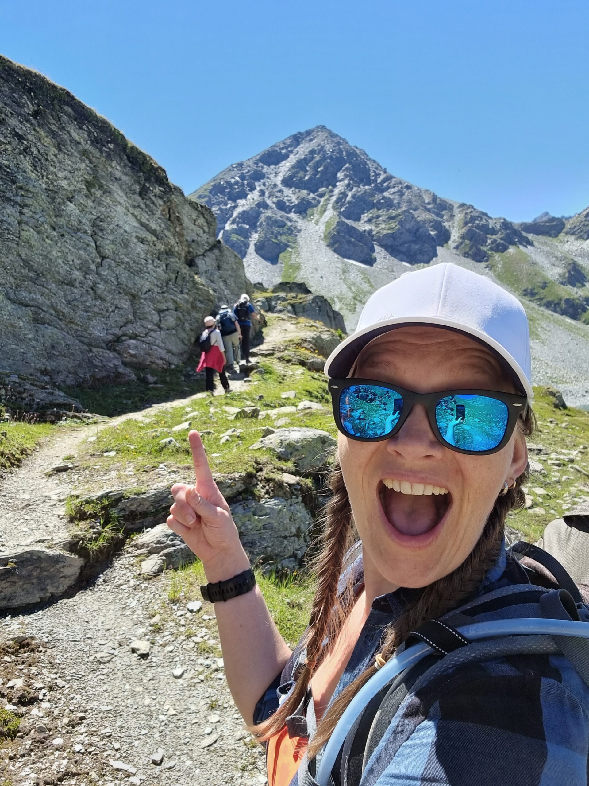 Behind the scenes of a proposal photographer in Switzerland working in the mountains