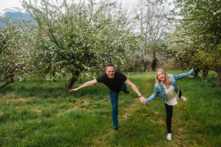 couple goofing together during a portrait session in switzerland