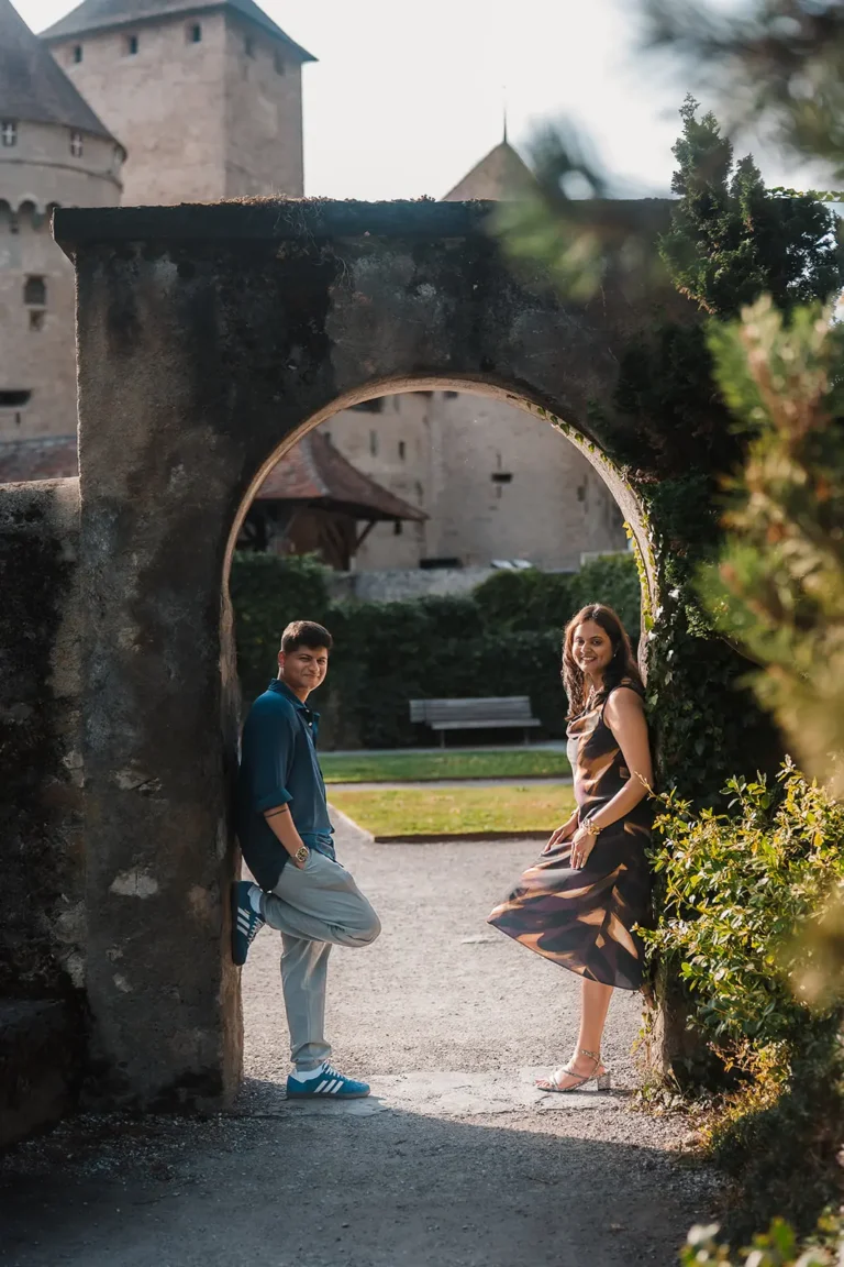 Newly engaged couple celebrating together near Château de Chillon in Switzerland