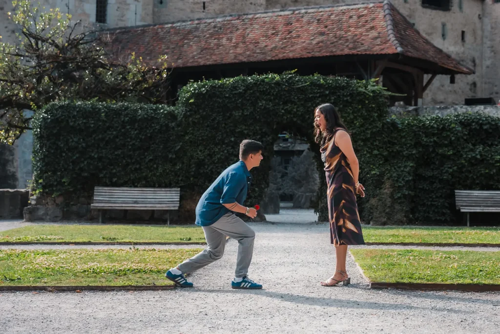 Surprise proposal by Lake Geneva near Château de Chillon in Montreux