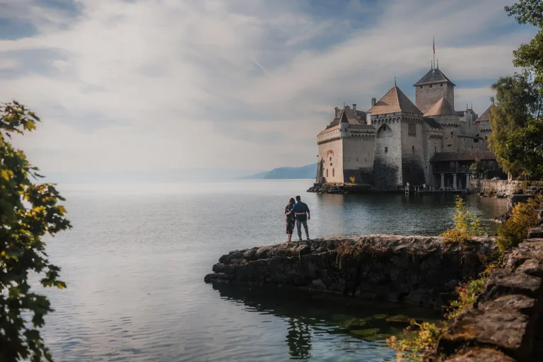 Newly engaged couple during their engagement session around Château de Chillon