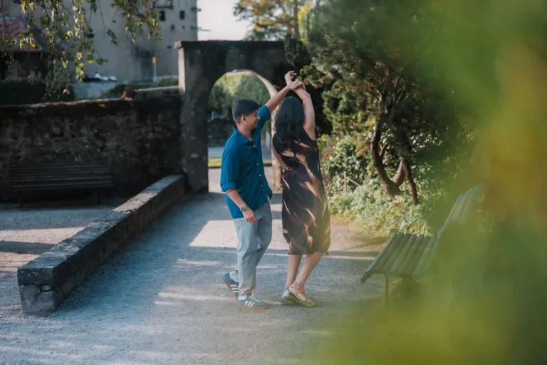 Couple photographed together beside Lake Geneva in Switzerland